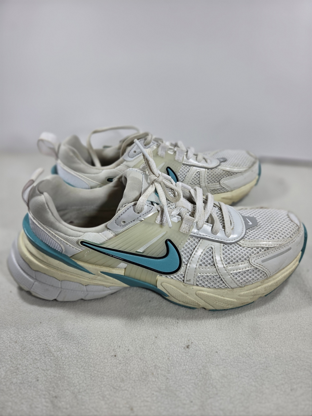 Nike Women’s White and Teal Running Sneakers